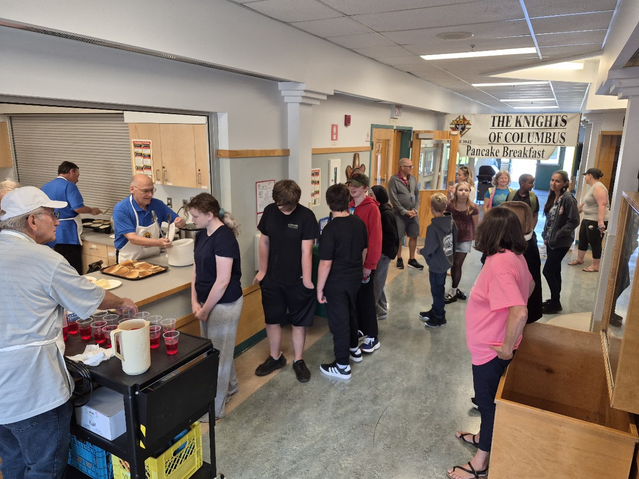 Students lined up for pancakes at Brechin School