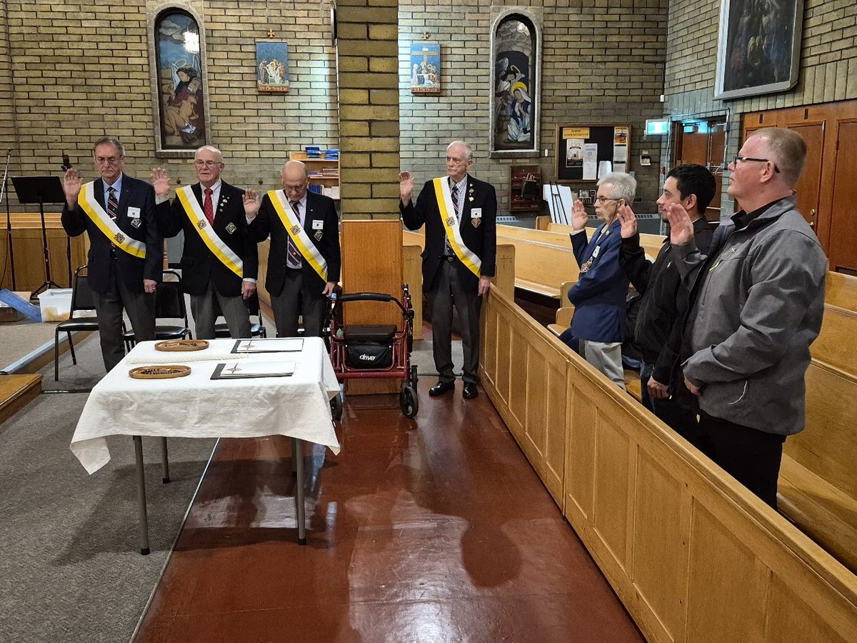 Knights standing together during the Exemplification