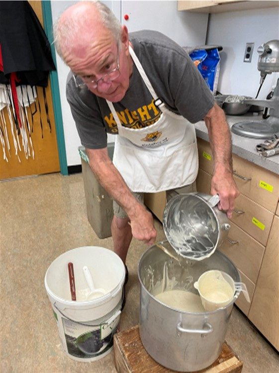 Preparing pancake batter for the breakfast