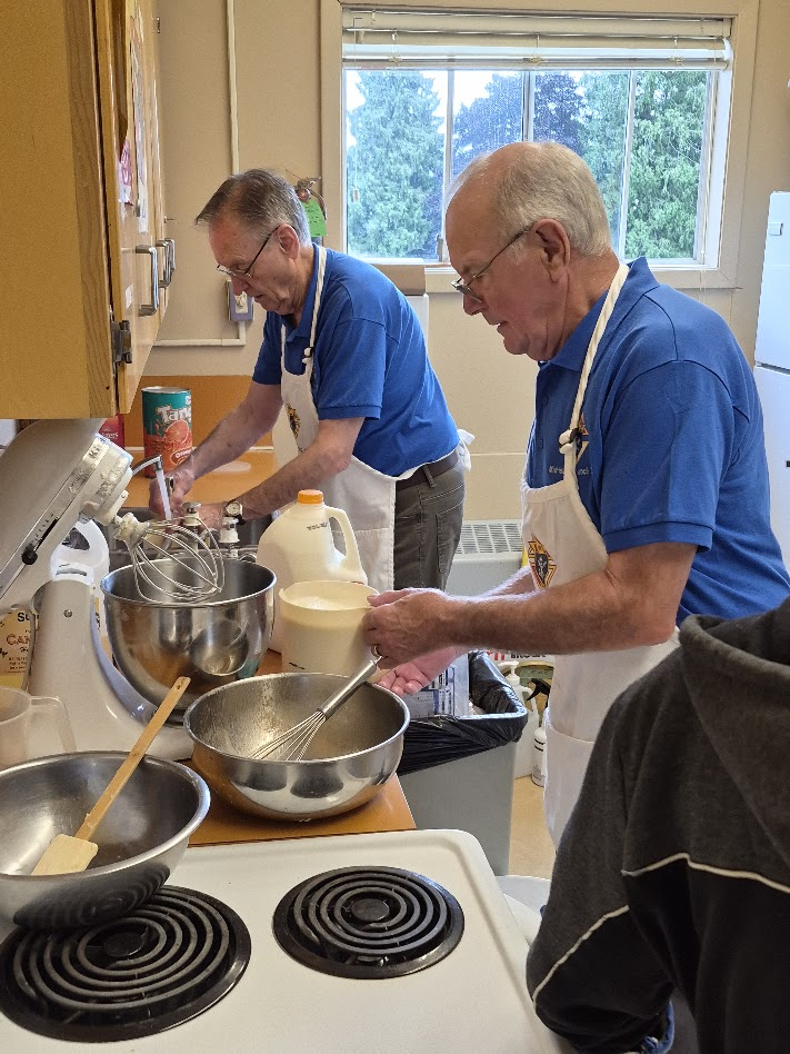 Mixing pancake batter in the school kitchen